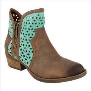 Not Rated teal and brown ankle boots.